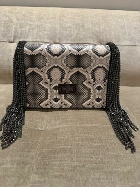 Snake-Print Fringe Crossbody Bag in Black and Cream